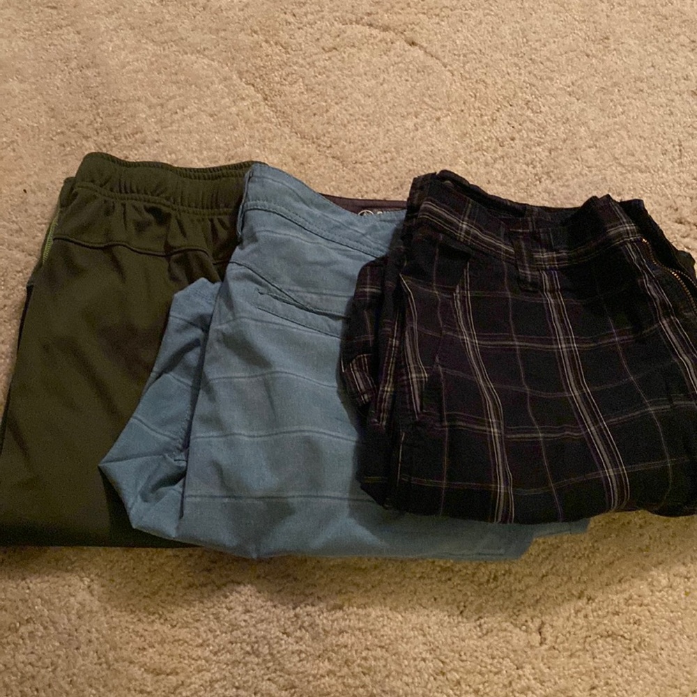 3 pairs of Mens shorts. 1 active sz L. One flat front 36 and one cargo 36.